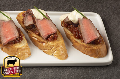 Sirloin Crostini with Tomato Chutney and Curry Sour Cream recipe provided by the Certified Angus Beef® brand.