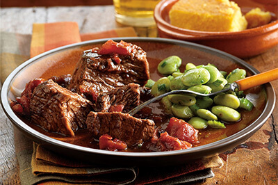 Smoky Chipotle Pot Roast with Cornbread recipe provided by the Certified Angus Beef® brand.