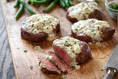 Tenderloin Steaks with Blue Cheese Topping recipe provided by the Certified Angus Beef® brand.