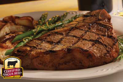 Porterhouse for Two with Lemon Potatoes & Asparagus recipe provided by the Certified Angus Beef® brand.