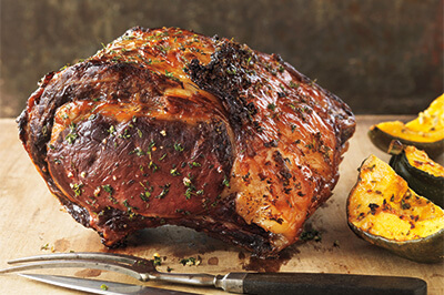 Maple-Glazed Rib Roast With Roasted Acorn Squash recipe provided by the Certified Angus Beef® brand.