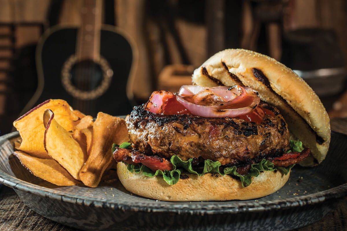 BBQ bacon cheddar burger on a bun