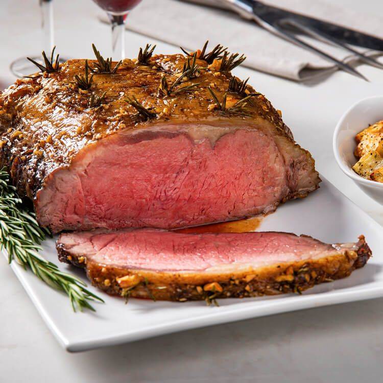 Garlic Rosemary Studded Strip Roast