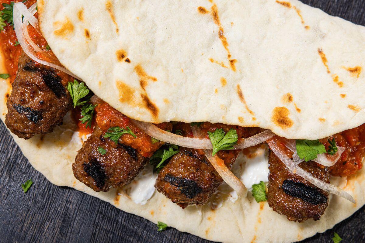 Cevapi Meat Cevapi with Ajvar and Flat Bread