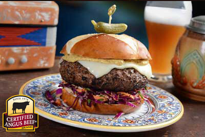 German Burger with Slaw & Swiss on Pretzel Bun recipe provided by the Certified Angus Beef® brand.