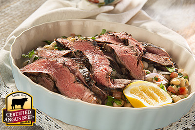 Grilled Rosemary Flank Steak with White Bean Salad recipe provided by the Certified Angus Beef® brand.